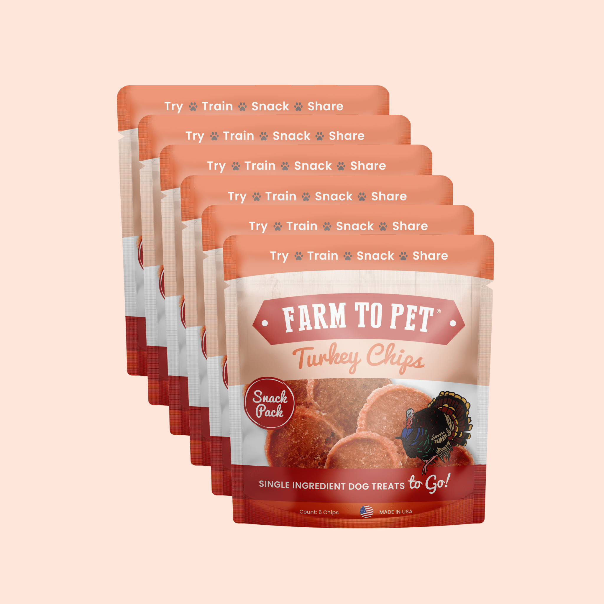 Multiple packages of Farm to Pet Turkey Chips on a beige background.
