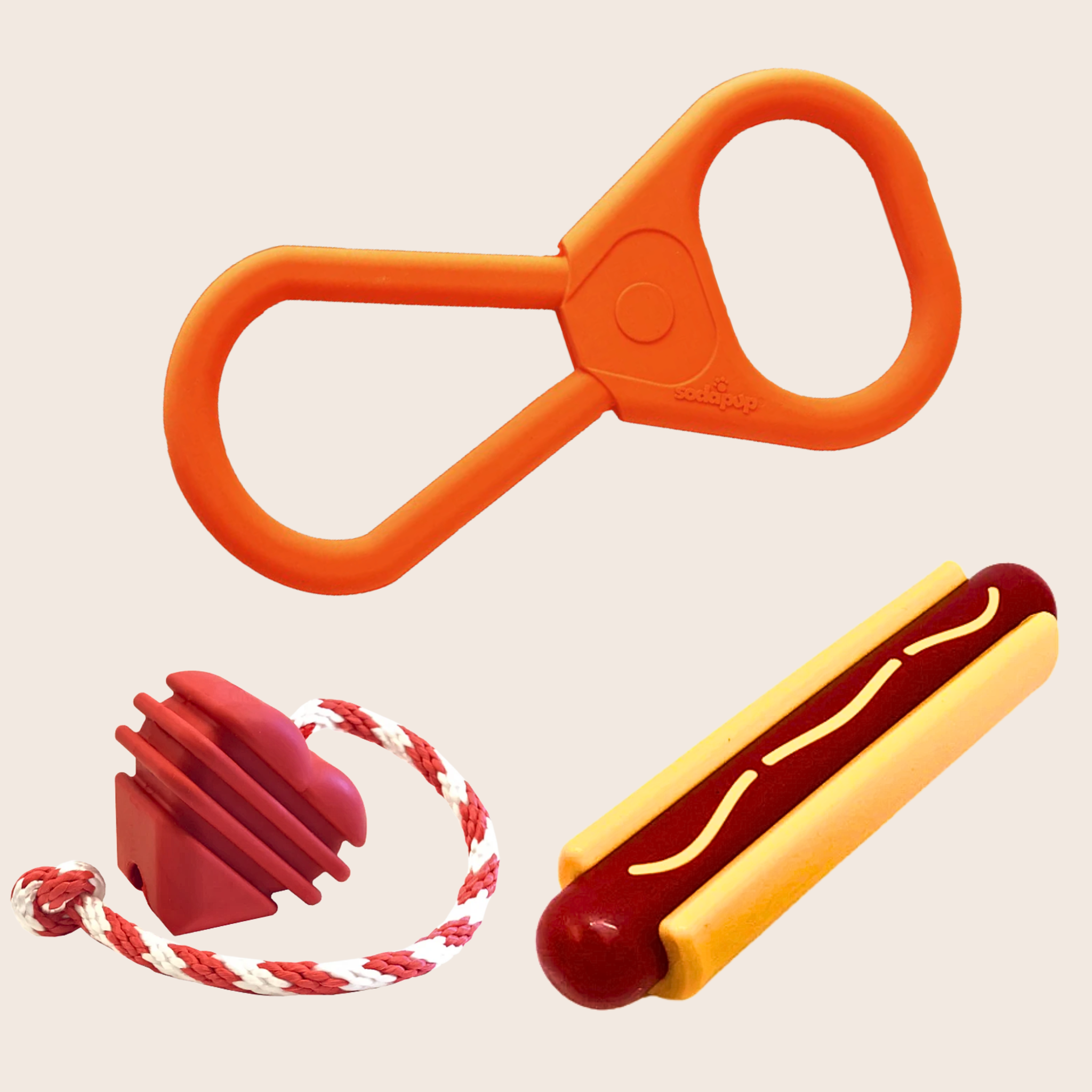 Orange plastic tug toy with a red and yellow hot dog-shaped chew toy on a beige background