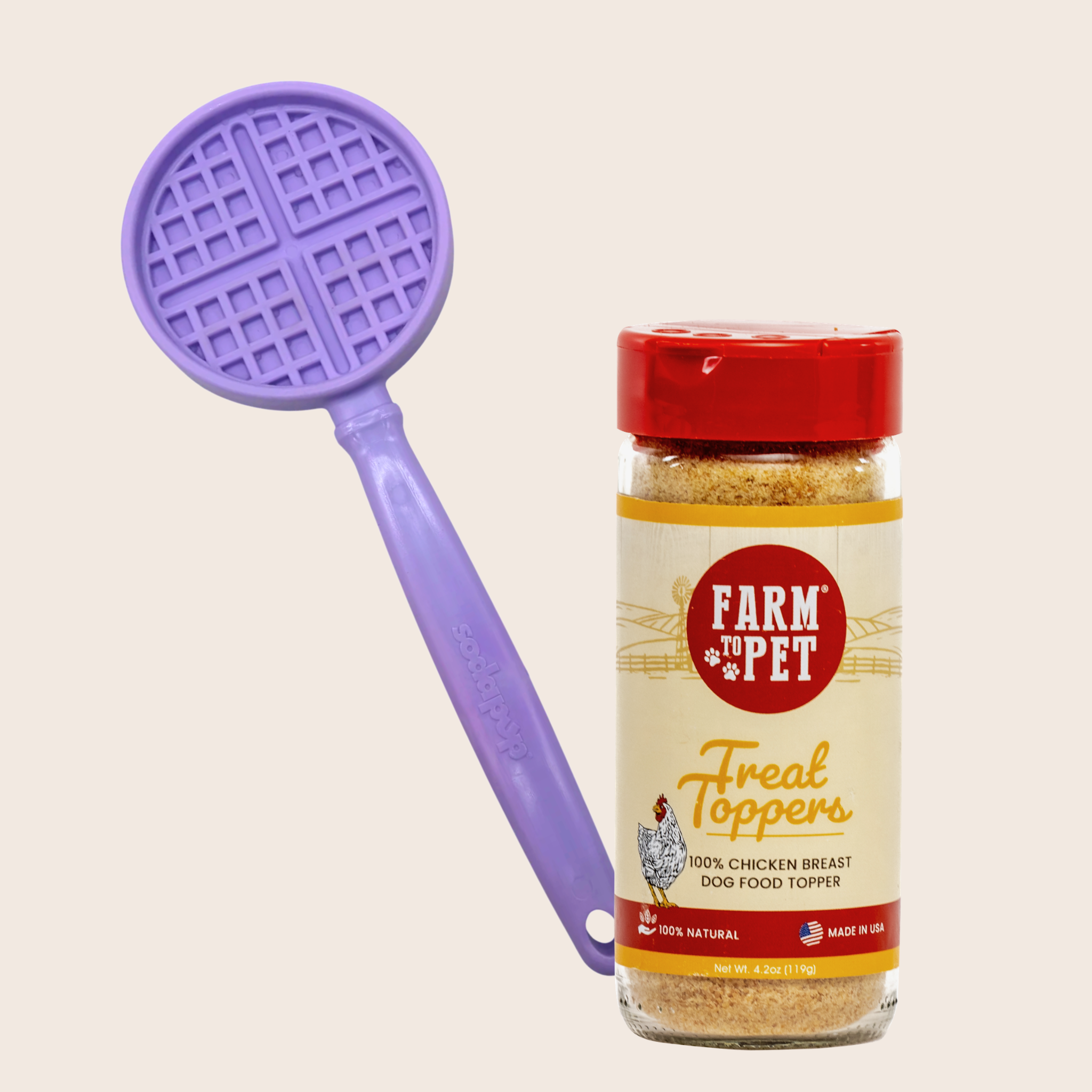 Purple waffle-style lick stick and jar of 'Farm to Pet Treat Toppers' on a beige background