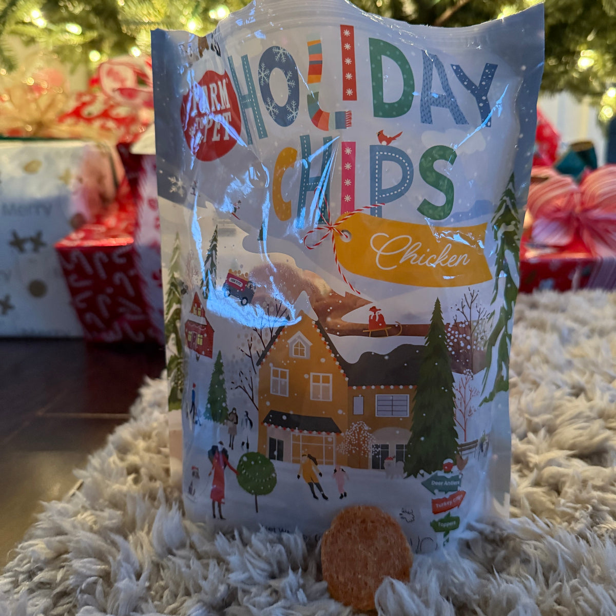 12oz Holiday Chicken Chips bag by the Christmas tree, healthy single-ingredient chicken dog treats