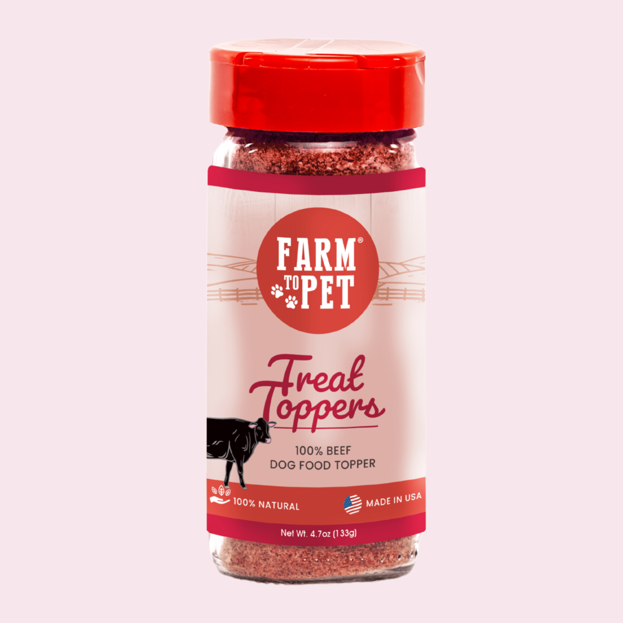 Bottle of Farm to Pet Beef Treat Toppers with a red lid on a light blue background.