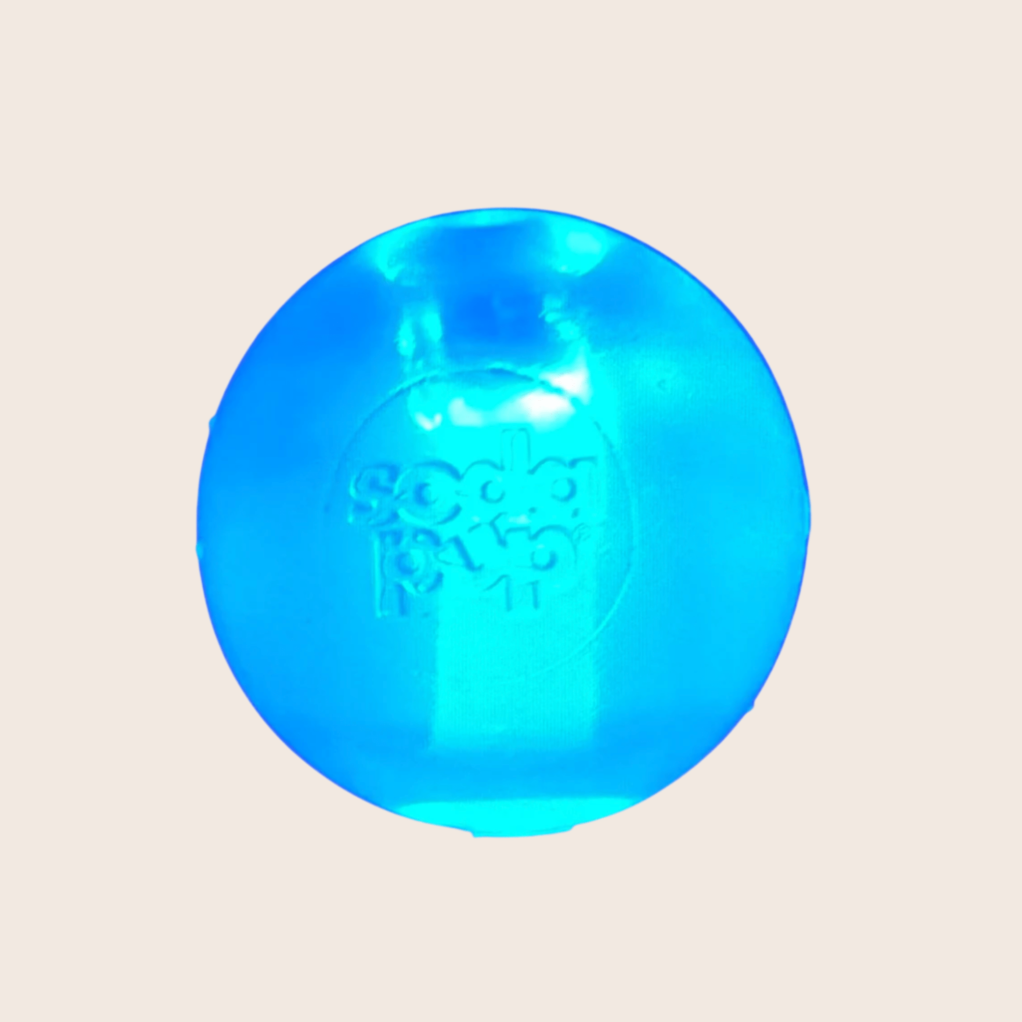 Farm to Pet Blue Floating Strobe Ball translucent ball with  on a beige background