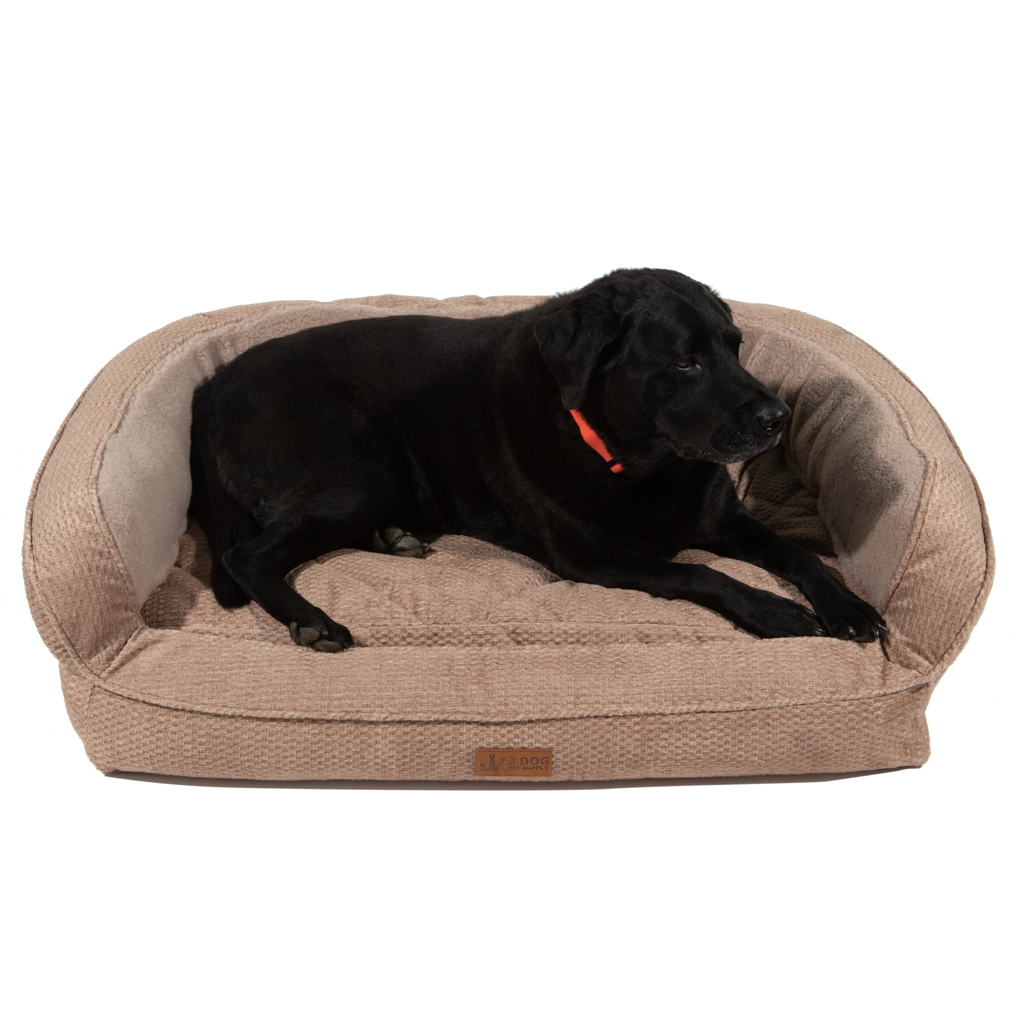 A Black dog resting in a comfortable bed by Farm to Pet Ez-Wash Tweed Shearling Memory Foam Dog Bed on a white background. 