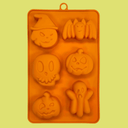Farm to Pet Halloween Pet Treat Mold made of Orange silicone with Halloween-themed shapes featuring the back of mold.