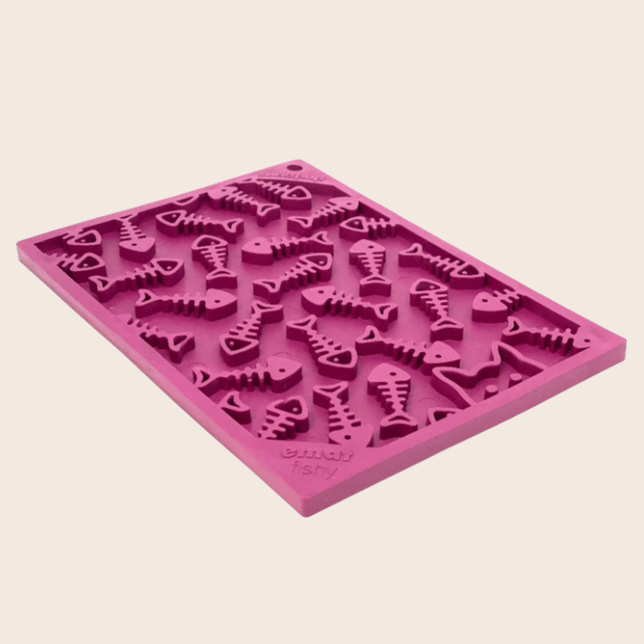 A maroon silicone lick mat from Farm to Pet with fishbone skeletons on a light pink background.