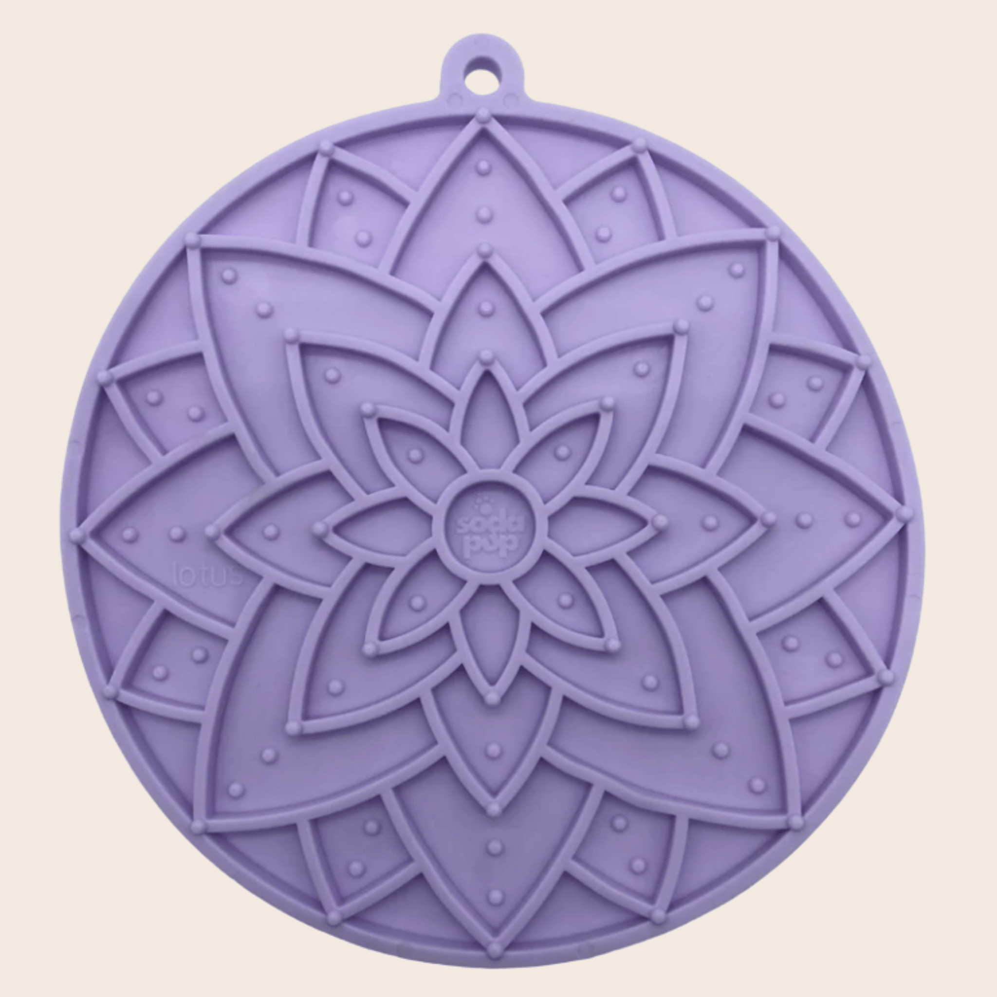 Farm to Pet Purple Lotus silicone lick mat with flower design on a beige background.