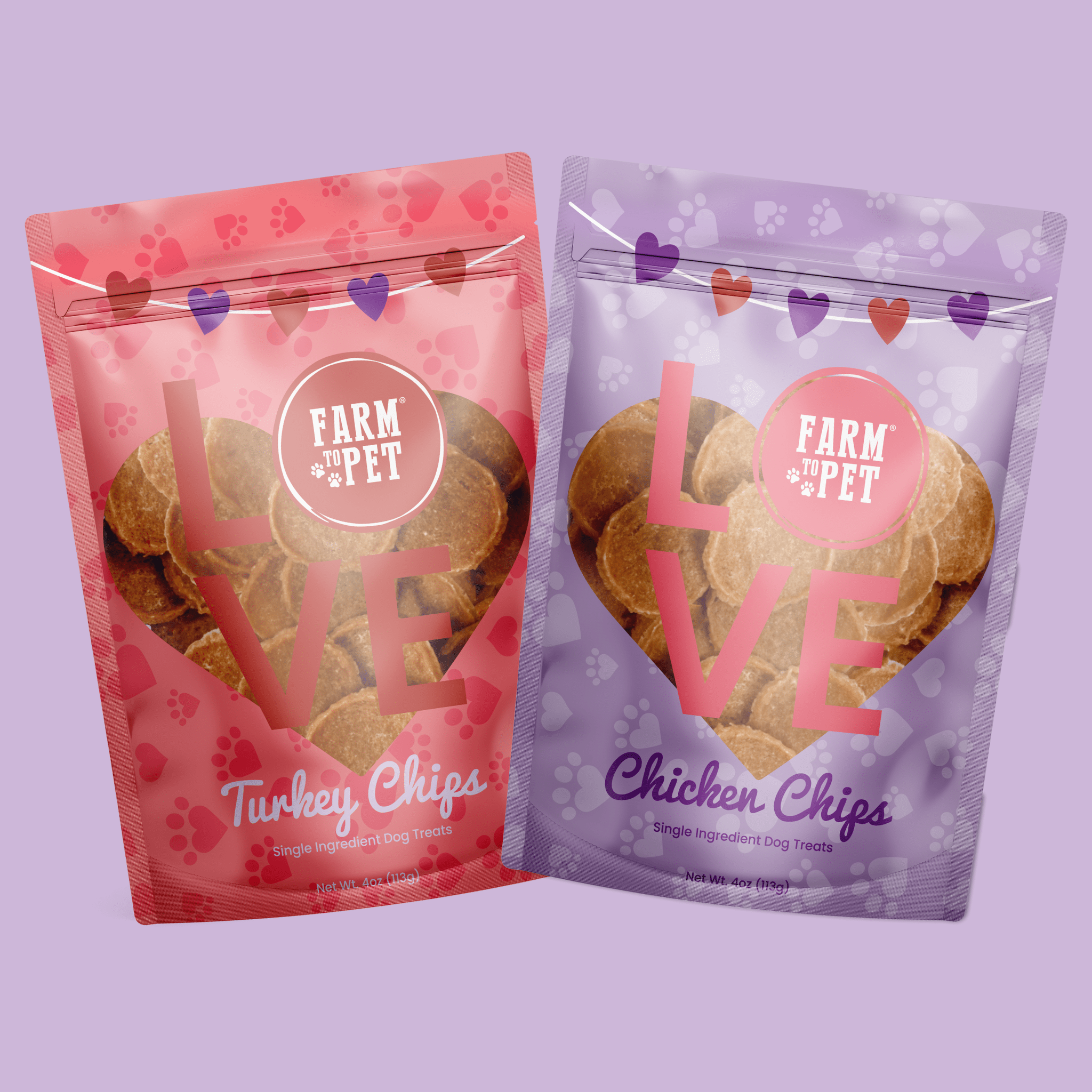 Two packages of Farm to Pet Puppy Love dog treats one pink and one purple on a light purple background with hearts.
