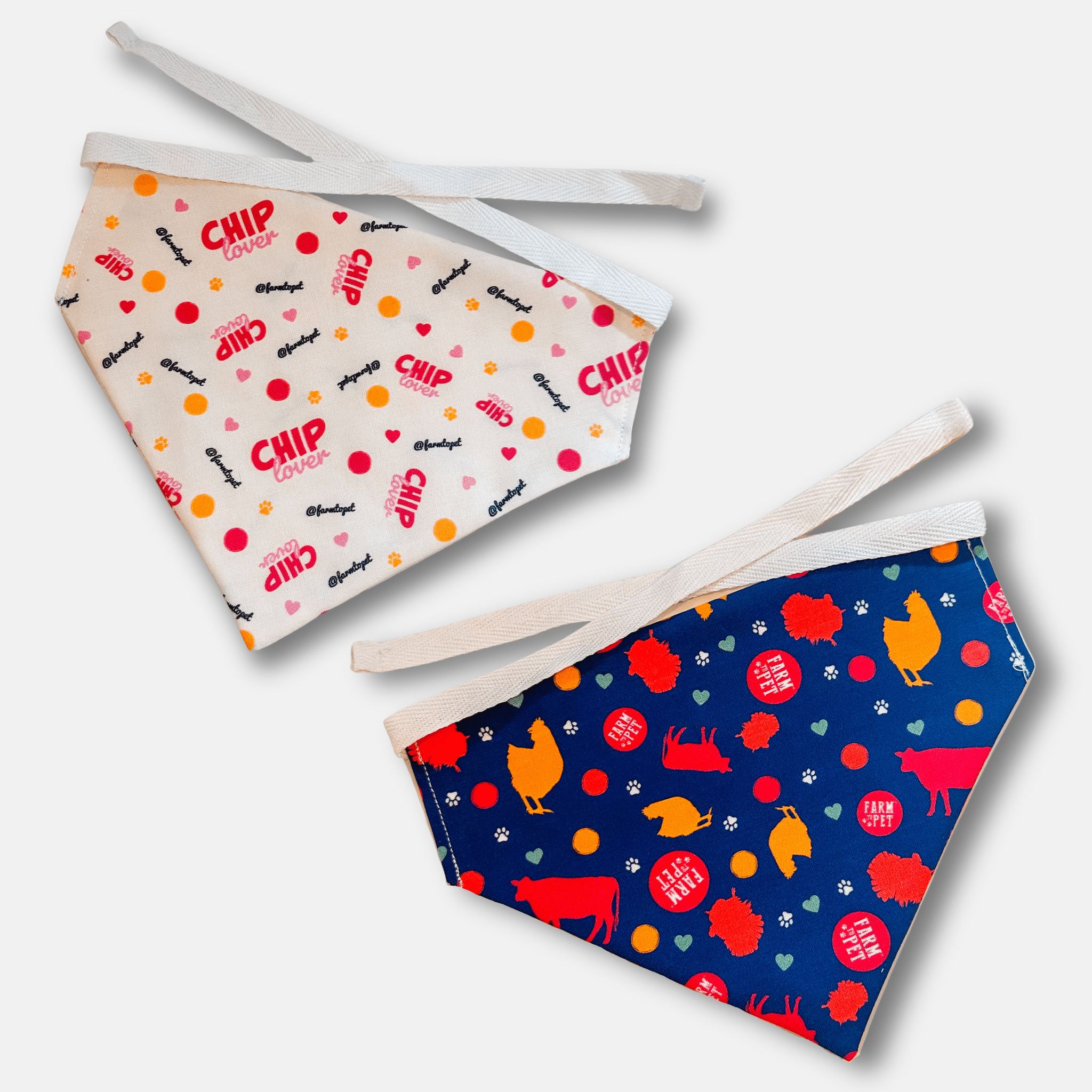 Two Farm to Pet dog bandanas with colorful patterns on a white background