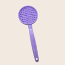 Purple waffle-patterned lick stick for dogs on a light beige background