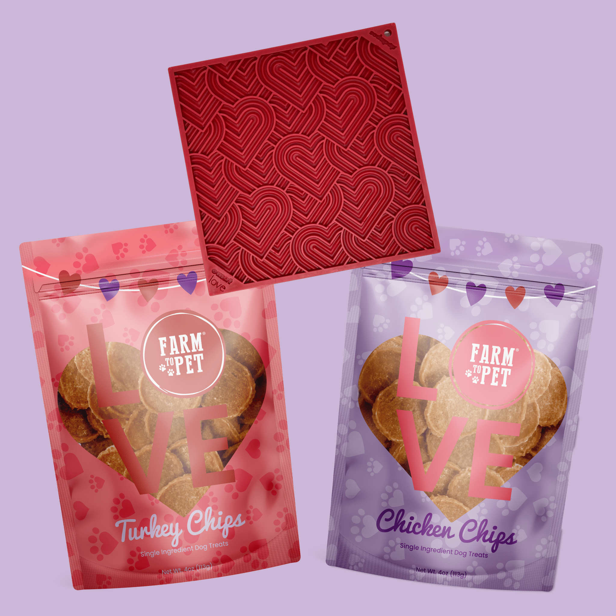 Two packages of Farm & Pet dog treats with a heart-shaped lick mat on a purple background